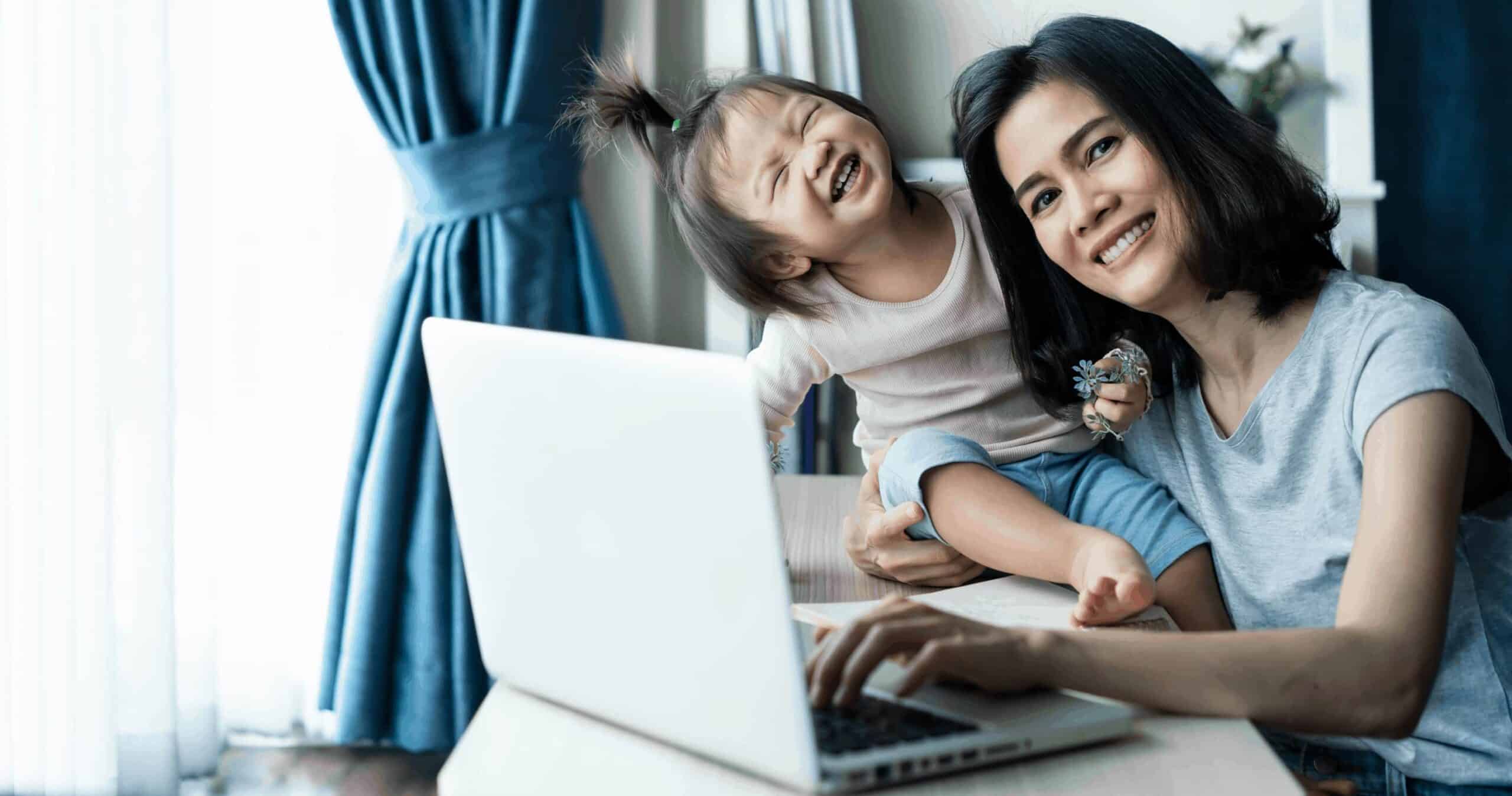 Woman and laptop and kid